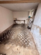 Garage - Großzügiges Einfamilienhaus mit 7 Zimmern, großem Garten und zusätzlichem Entwicklungspotenzial