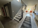 Eingangsbereich - Exklusives Architektenhaus mit Dachterrasse, Pool und Kunstfokus