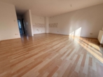 Wohnzimmer mit Blick auf Kochb - Ihr neues Zuhause – modern und lichtdurchflutet